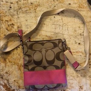 Pink/tan Coach Crossbody purse